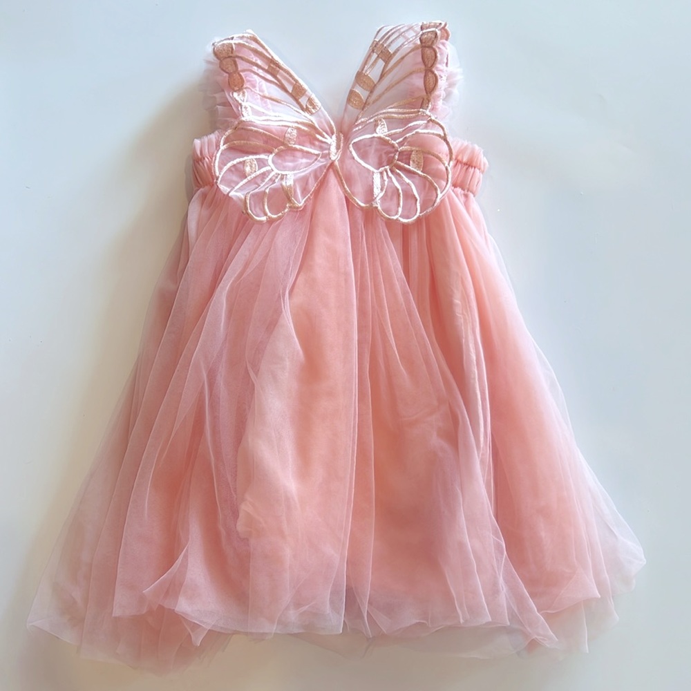 Butterfly back tulle dress.